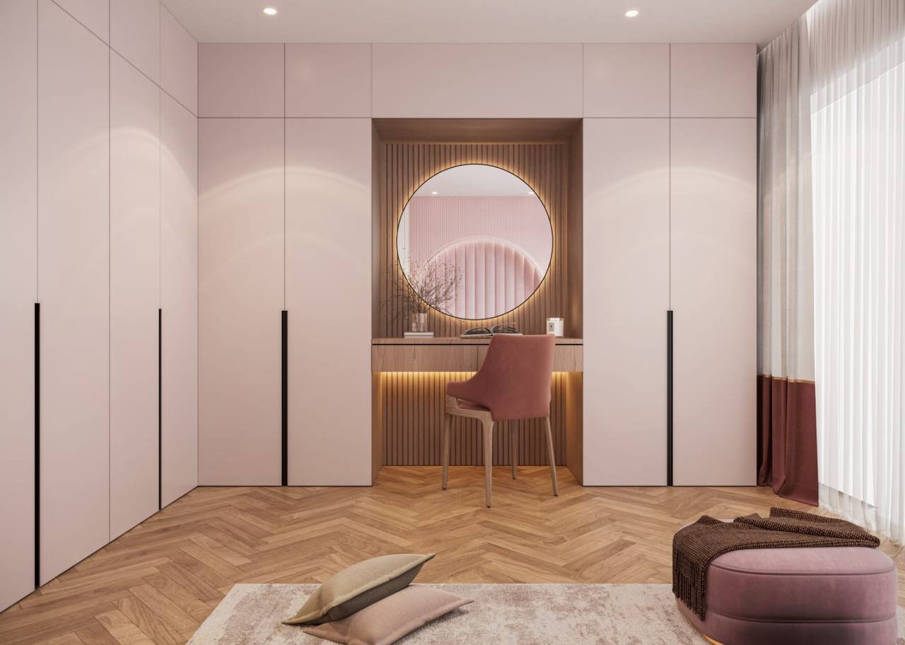 Rendu 3D d’un dressing rose avec coiffeuse et miroir rond
